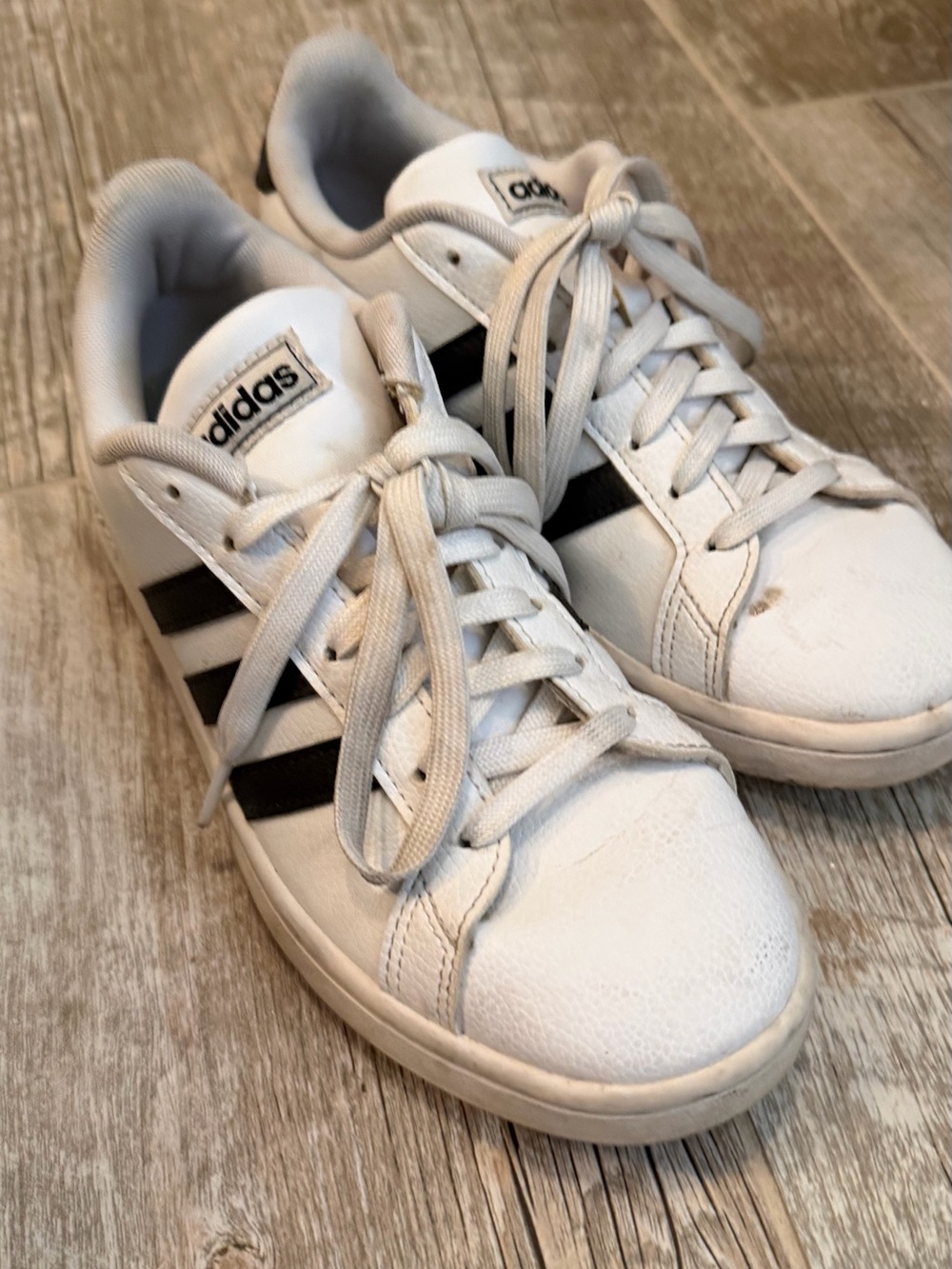 Women’s adidas White Sneakers with Black Three Stripes